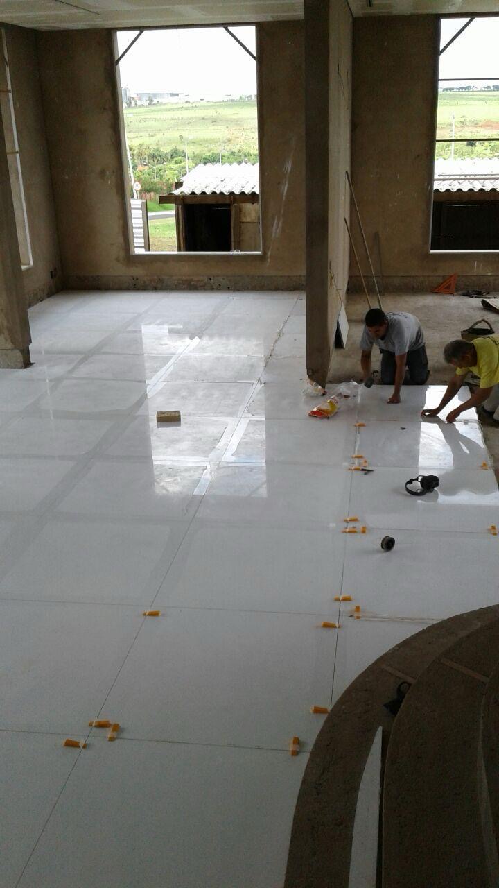 Large-format tile floor being installed in a commercial space by BBJ Flooring Corp